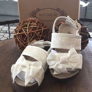 White joyfolie sandals.